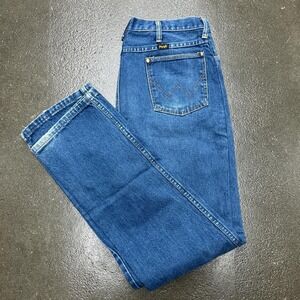 Vintage 90s Made In The USA Wrangler blue jeans straight leg dark Wash baggy